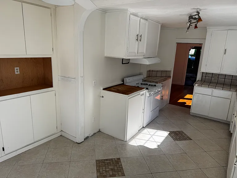 Kitchen with lots of storage in the pantry.