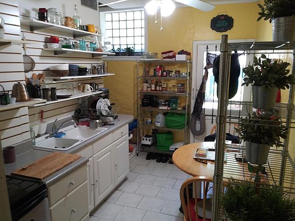 sunny bright kitchen area (the place comes unfurnished, but this is just a layout example from a prior resident)