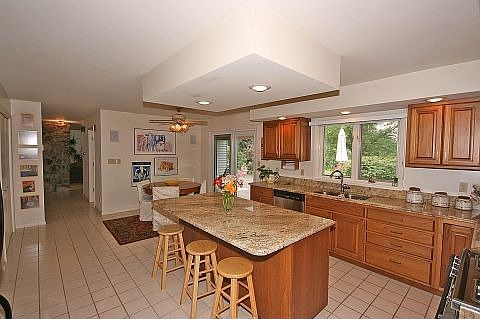 Granite counters and an abundance of cabinets