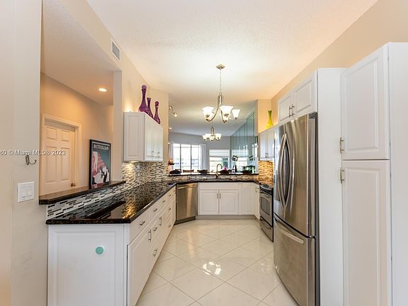 5th image of 7590 Granville Dr #410