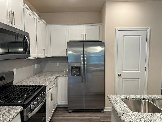 877 Falls Grove Trl — Photo 37