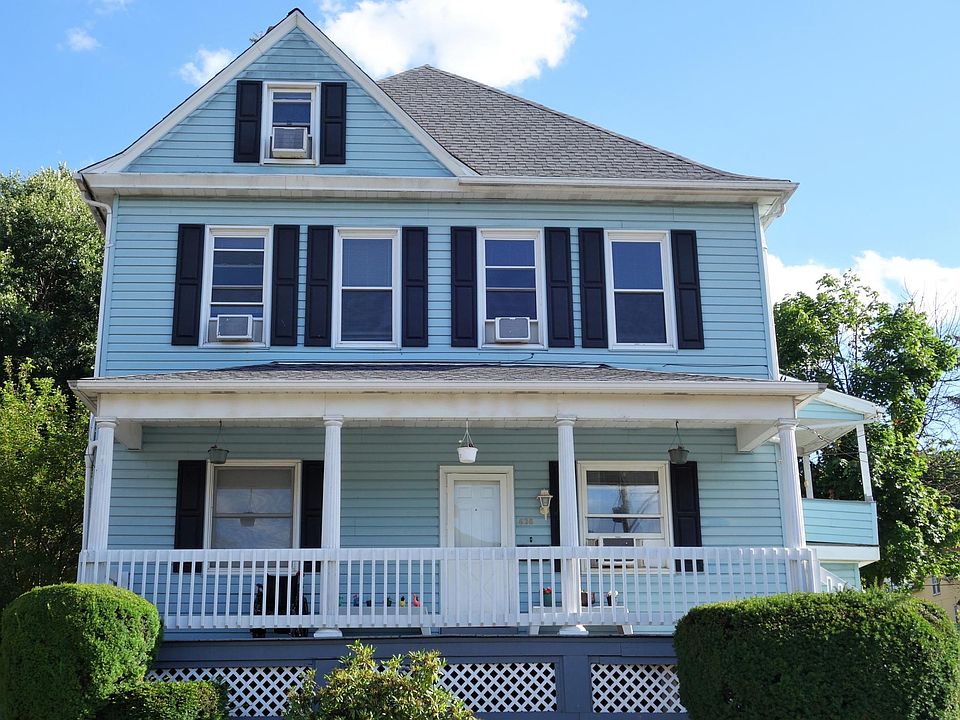 Front of unit facing Marne Avenue. Rental unit includes entire second and third floors.
