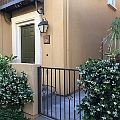 Gated entry with patio