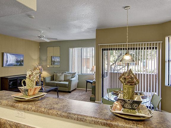 Arezzo Apartments - large windows with abundant natural light and sliding balcony door