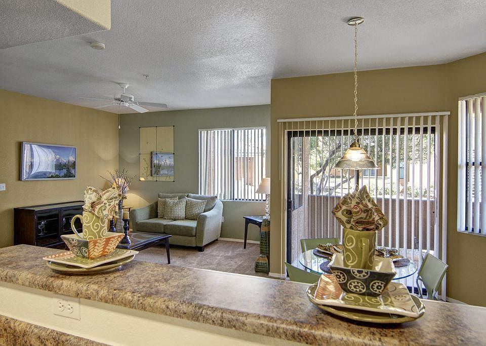 Arezzo Apartments - large windows with abundant natural light and sliding balcony door