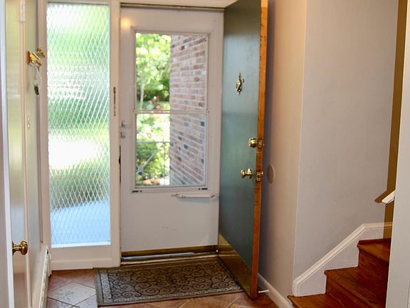 Inviting foyer with large coat closet