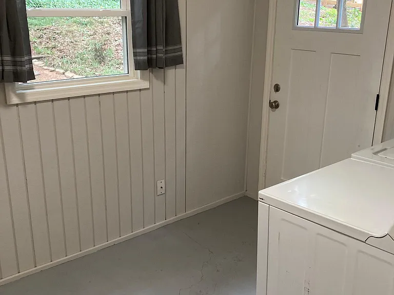 Laundry room off kitchen.