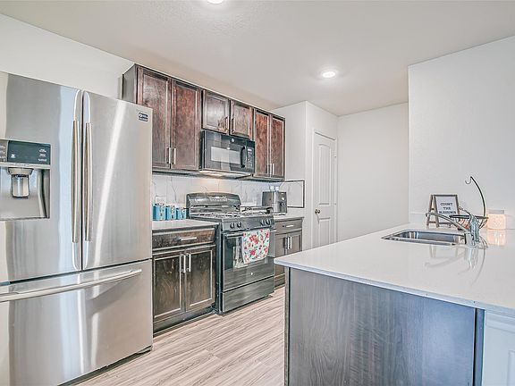 The pictures were taken when the property was occupied. The refrigerator is not included as shown in the picture.