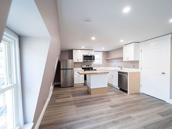 Beautiful newly restored kitchen/shared room, modern appliances and butcher block island!
