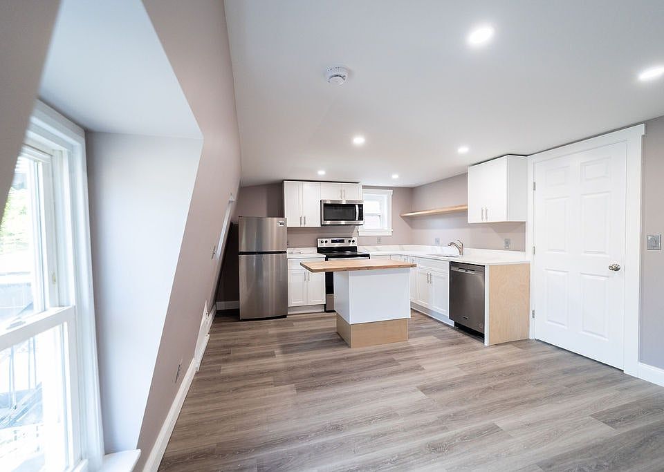 Beautiful newly restored kitchen/shared room, modern appliances and butcher block island!