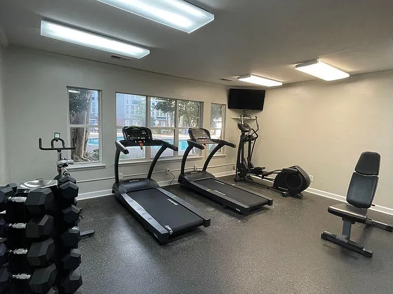 Community fitness center with modern equipment, conveniently located on-site.