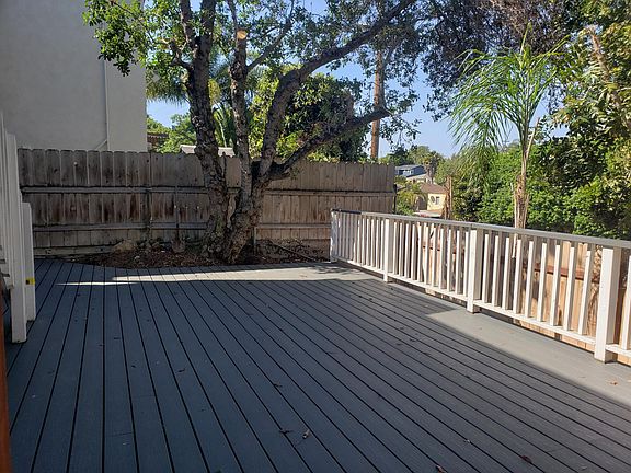 Massive deck and fenced in yard provides security, privacy, and safe space for pets; exclusively for unit B.