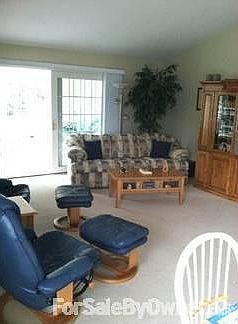 Dining / Living Area : Lots of daylight from sunroom, bay window, box window and front door.