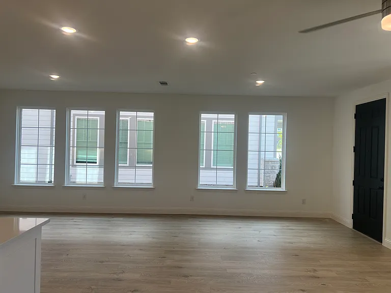 Living room with extra windows on end unit