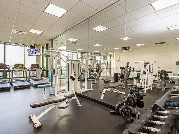 Fitness center offers a wide variety of exercise equipment and a separate exercise room for group classes.