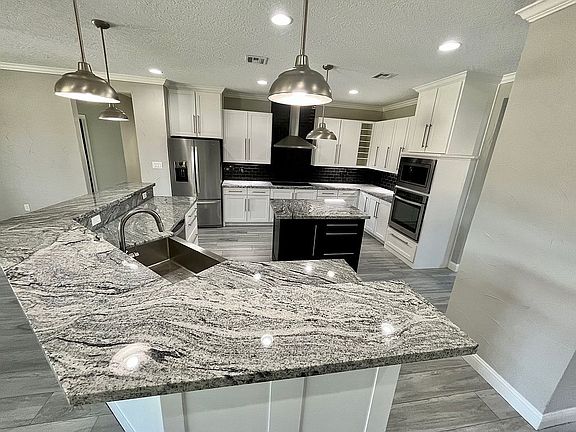 4th image of 12045 Woodhollow Dr