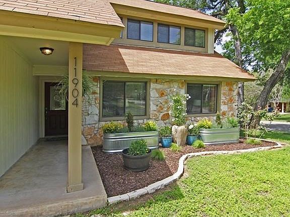 Pride of ownership shows throughout 11904 Rust Road.