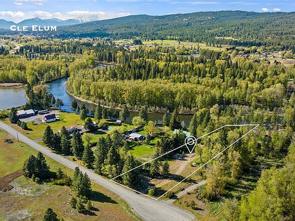 Minutes to town yet removed from the hustle and bustle. This incredible property sits on 1.5+ acres with approx 150' of Yakima River frontage.>