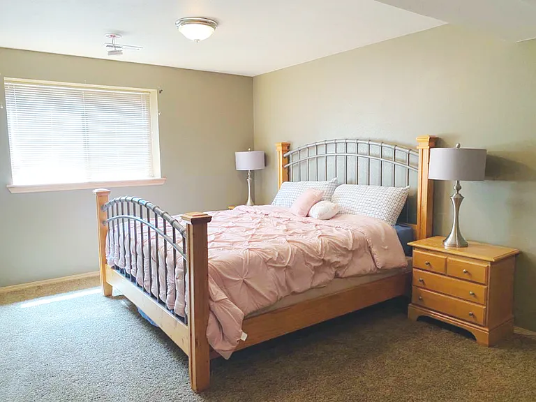 3rd bedroom in basement with large walk-in closet and large egress window