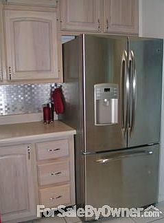 Stainless Steel Appliances
						:
						Kitchen is fully equipped with stainless steel appliances and backsplash.