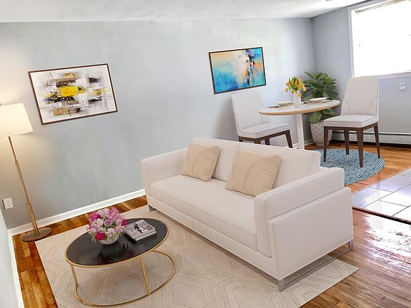 Heritage House Apartments Located at 1909 Church Street in Rahway NJ, And 905 Ross Street, Open Living/Dining Room