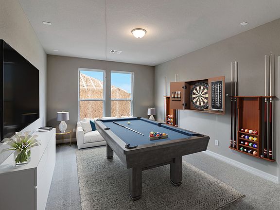 Come upstairs and enjoy a day of leisure in this fabulous game room. This is the perfect hang out s