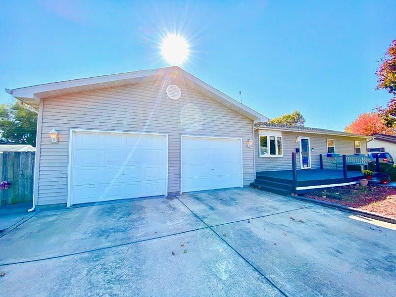 Front view, 2 car garage