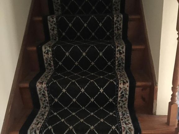 Stairs to bedroom and bathroom