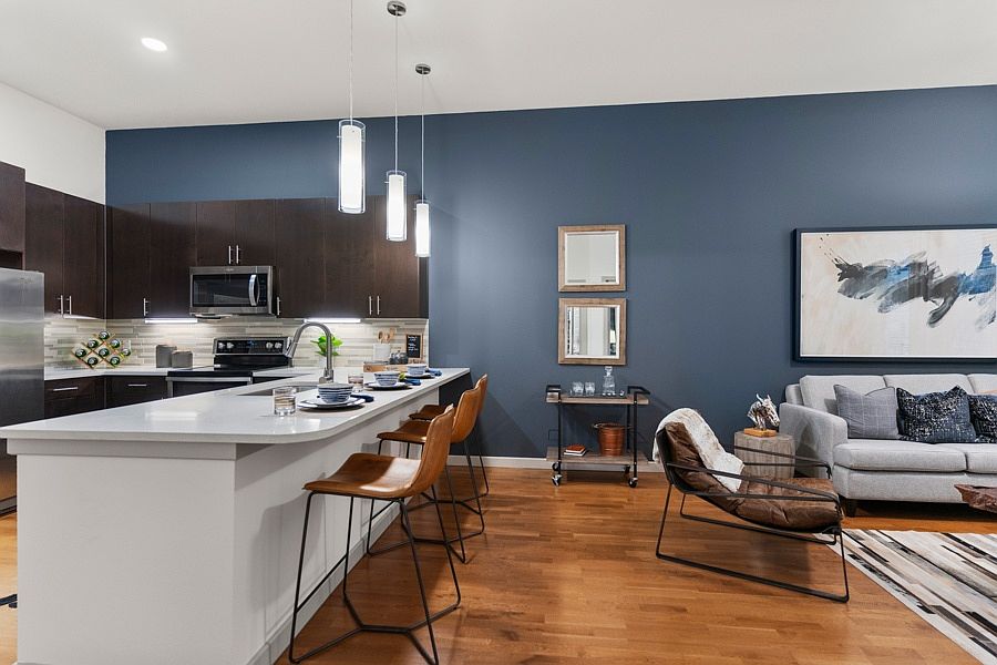 Interior finishes include concrete or luxury vinyl plank flooring and two-tone paint