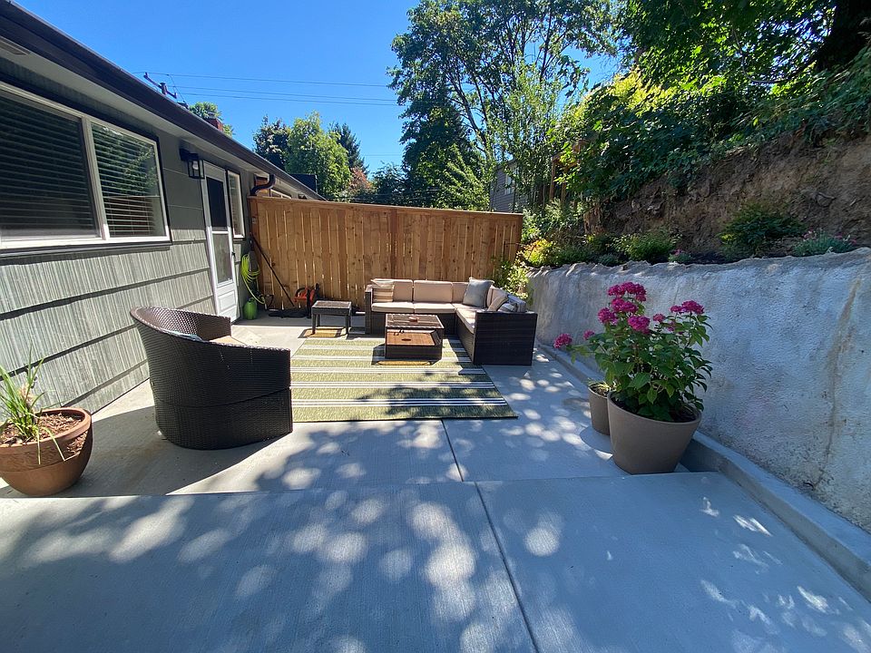 30 x 15 private fenced patio with room for grilling, dining and entertaining.