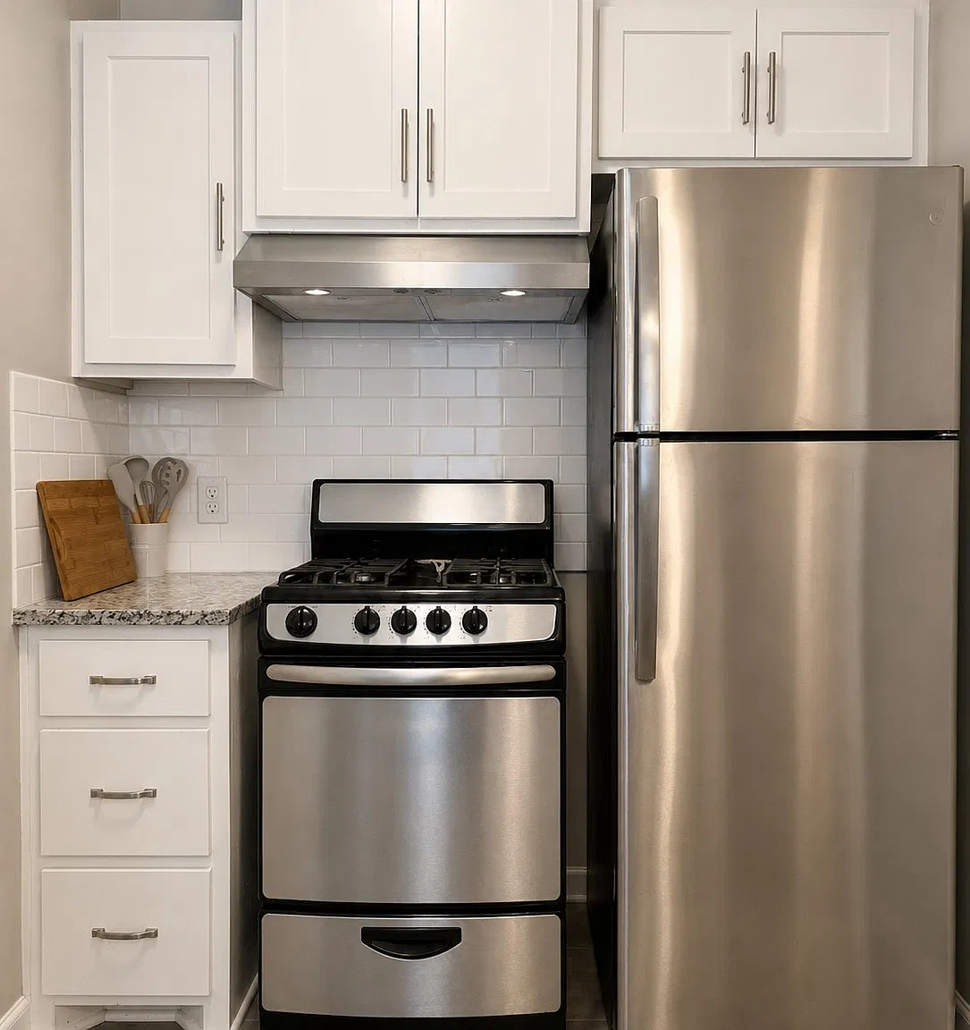 Full kitchen: range and a full-size stainless fridge