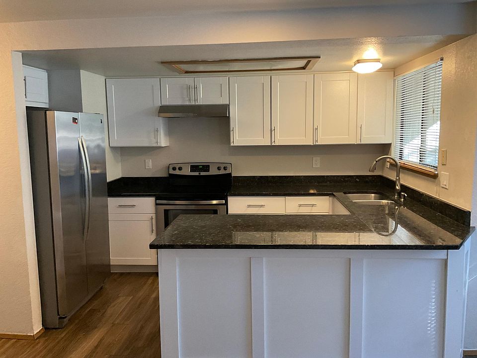 Remodeled kitchen with granite countertops
