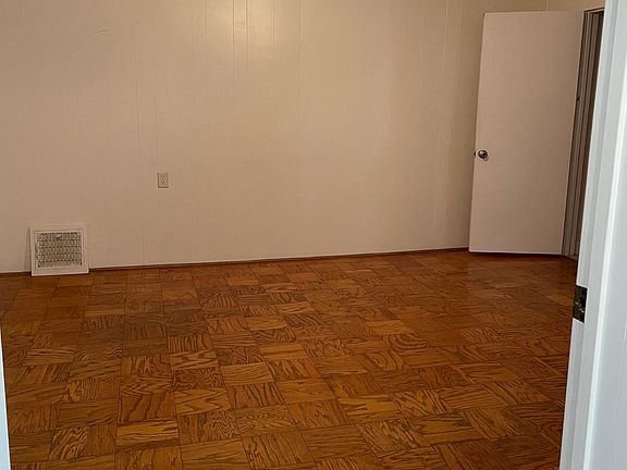 living room, bathroom and kitchen to the right