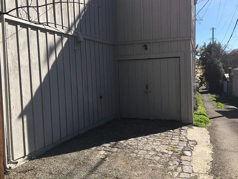 Off street parking and small garage at rear of the property with ally access.