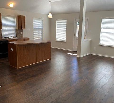 Family room, eat in kitchen and island.