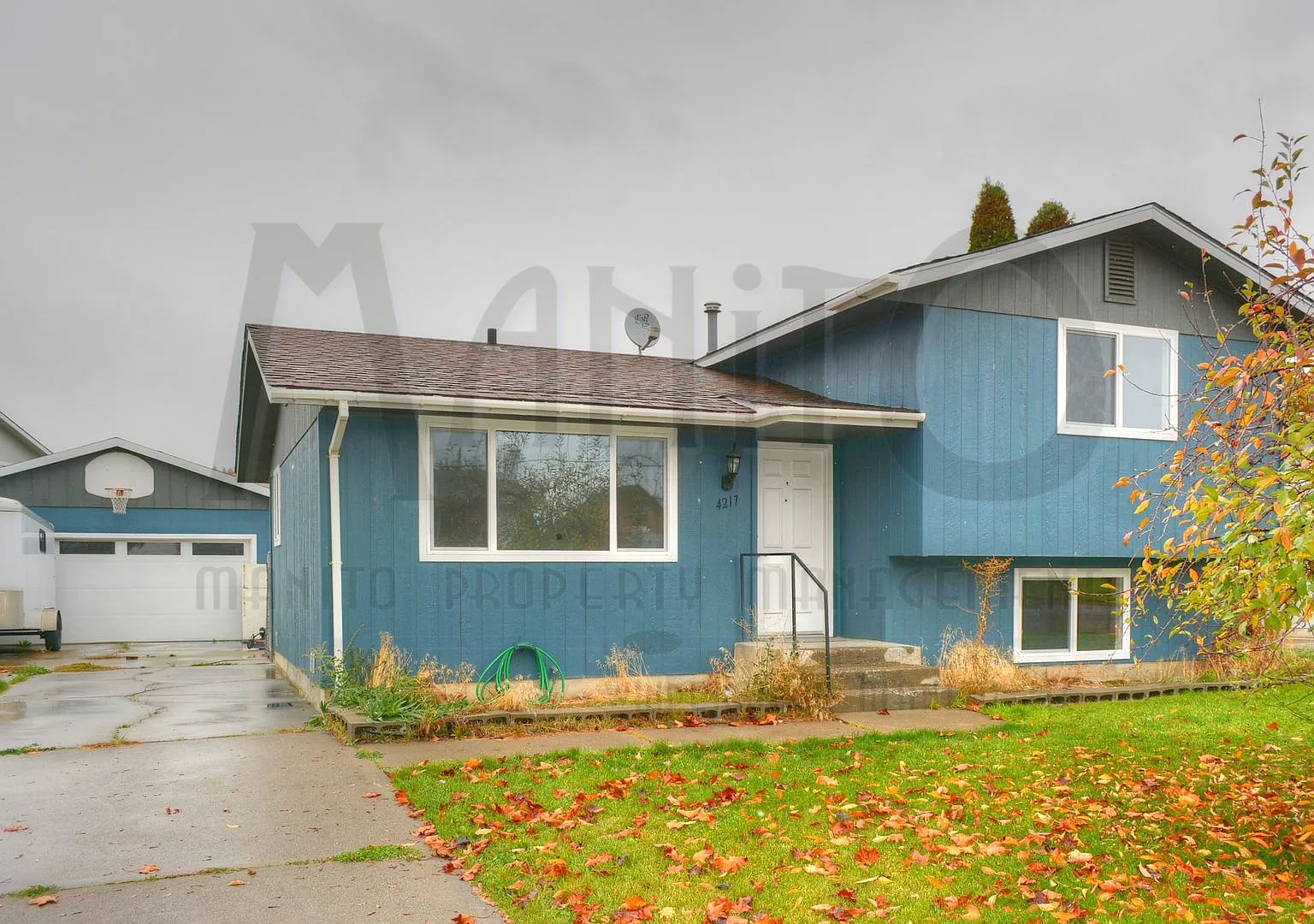**Coming Soon** Trendy Tri-Level Home — Photo 1
