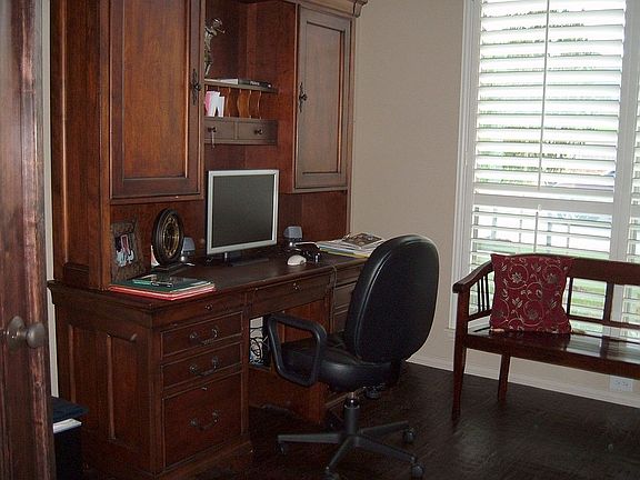 STUDY WITH SCRAPED WOOD FLOORING