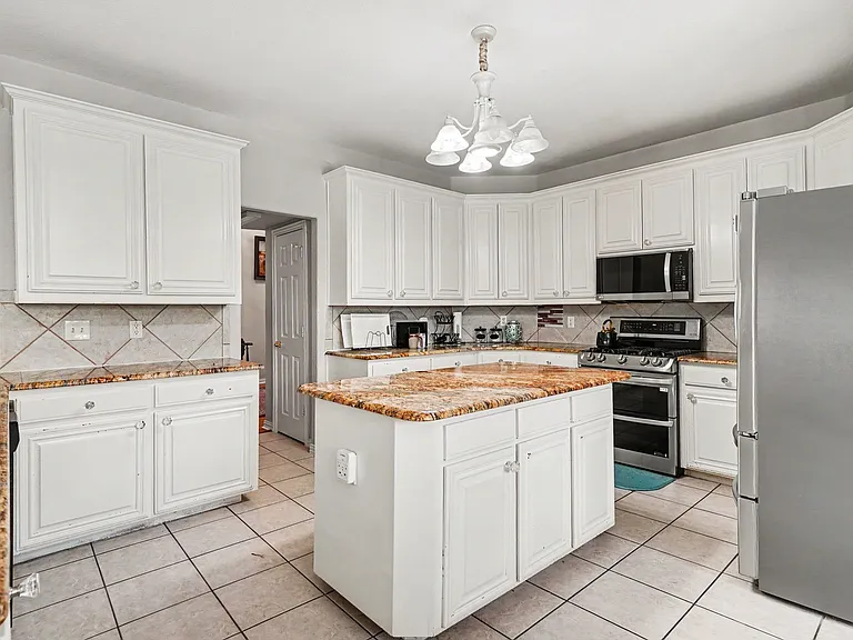8660 Lariat Cir — Photo 40