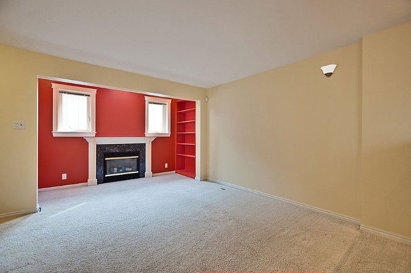 The open room concept is great for entertaining and comfortable for everyday living. The kitchen features gas cooking, tile counter tops, a built in microwave, dishwasher and double sink.