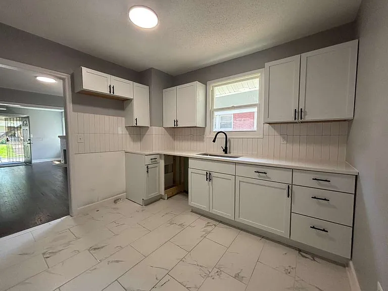 1850 E 68th Ter — Photo 12