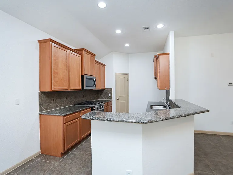 7042 Windy Run Ct — Photo 15