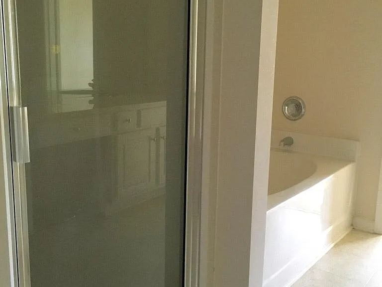 Master bath with standing shower and Garden tub