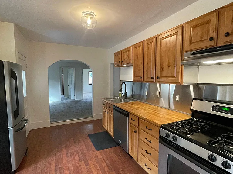 kitchen looking into the back living room and bedrooms