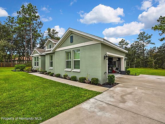 4th image of 6098 N Peardale Ter