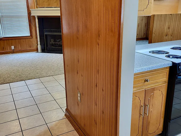 Hallway Entry coming in from front door to kitchen on the right or straight to living room and dining area.