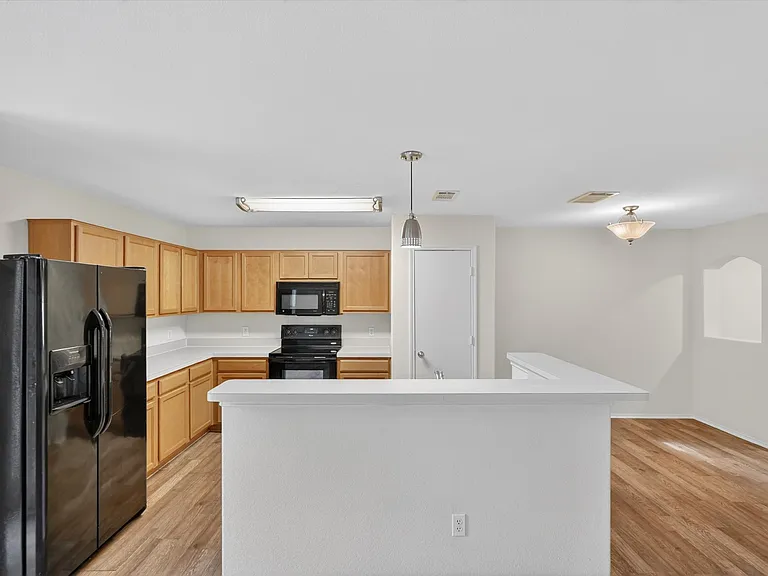 7401 Cowhand Ct — Photo 9