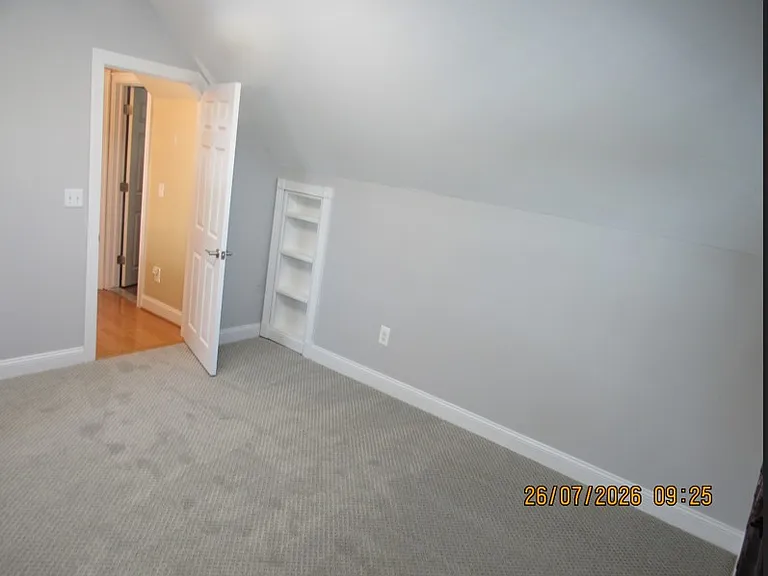 another view of the upper bedroom
