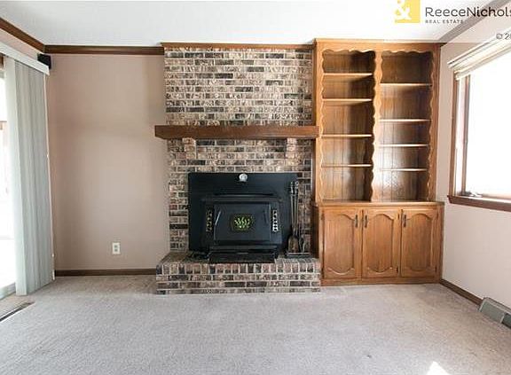 First floor family room with fireplace and built-ins