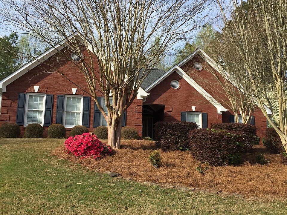 Large brick 3/2 ranch in popular Arbor Clos swim/tennis, Close to every amenity.