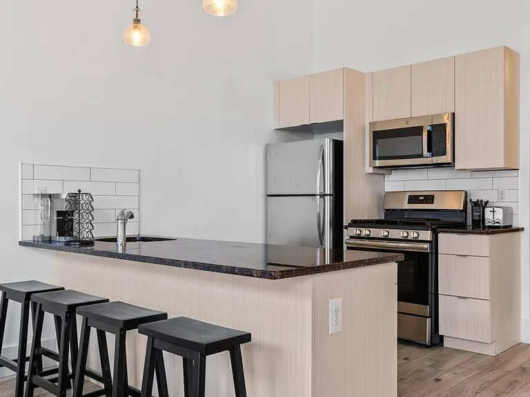 300 Hoyt Realty Inc — Photo 16